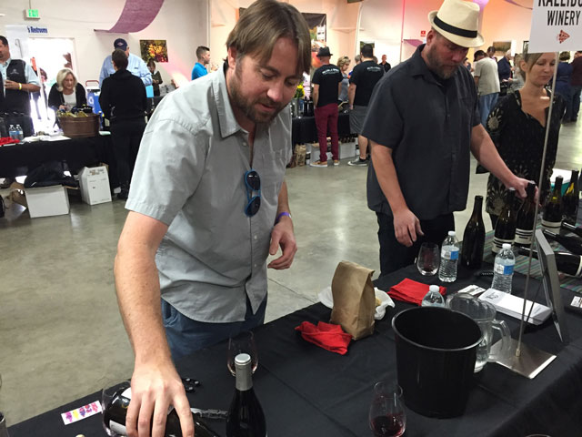Winemaker Jacob Toft pours his petite sirah.